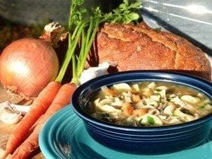 chicken soup recipe made with healthy ingredients in a solar oven
